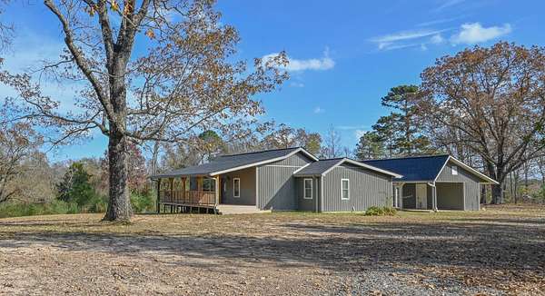 5.15 Acres of Land with Home for Sale in Mena, Arkansas