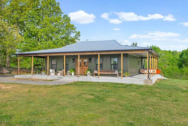 20.7 Acres of Land with Home for Sale in Woodlawn, Tennessee