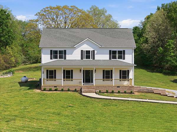 14.3 Acres of Land with Home for Sale in Dickson, Tennessee