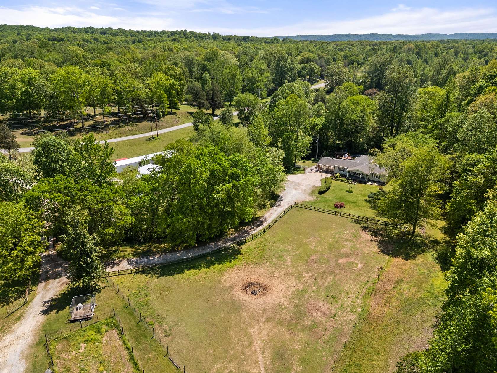 26 Acres of Agricultural Land with Home for Sale in New Johnsonville, Tennessee