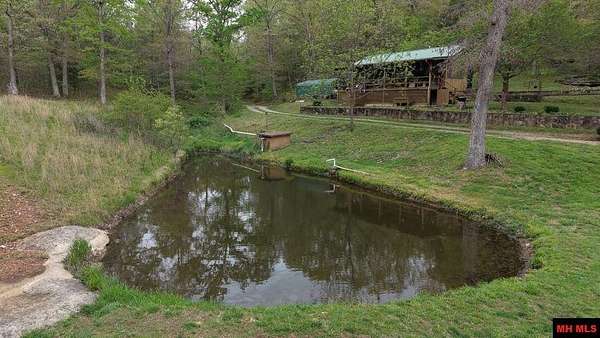 70.4 Acres of Recreational Land with Home for Sale in Valley Springs, Arkansas