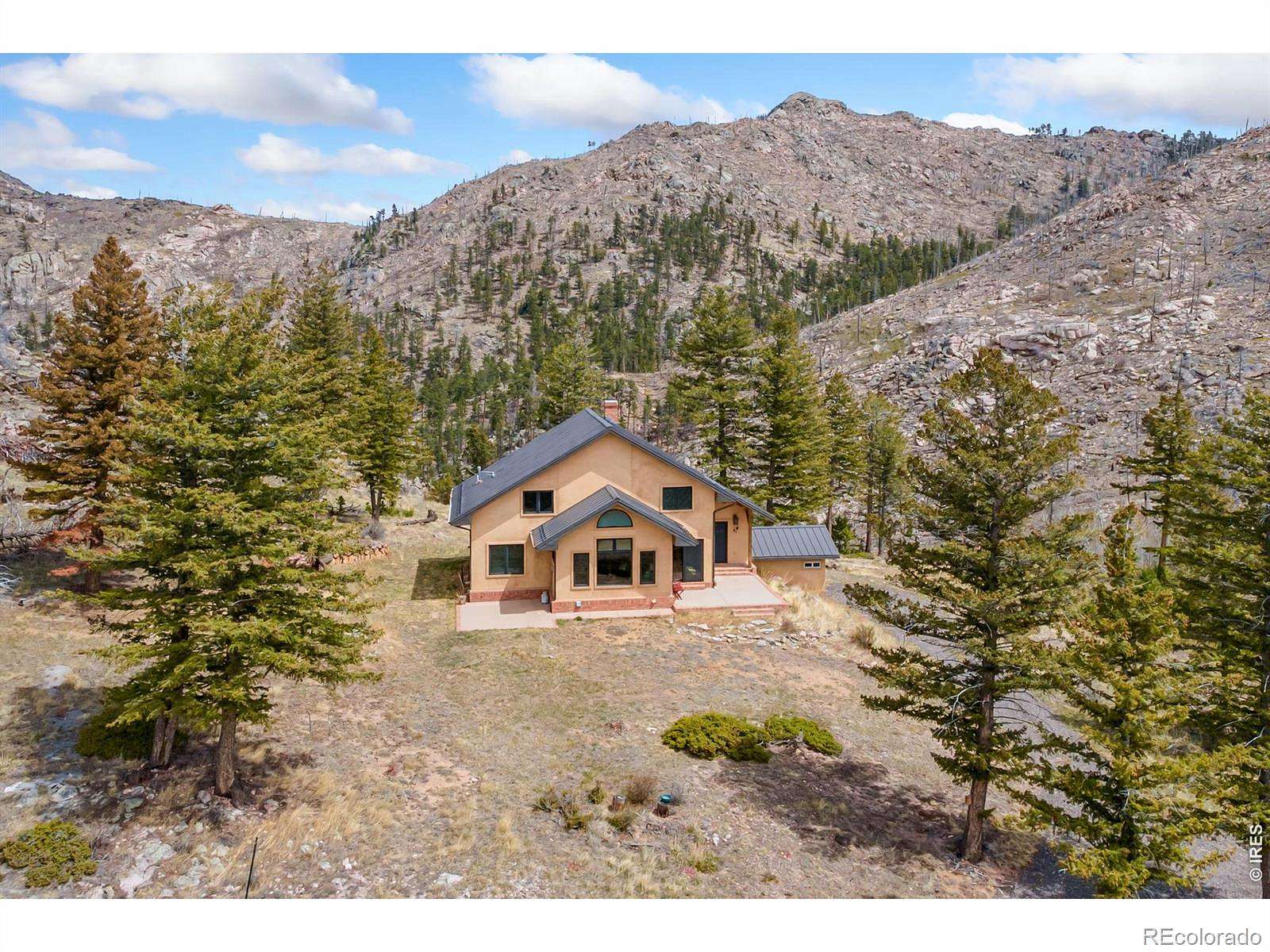 40 Acres of Recreational Land with Home for Sale in Bellvue, Colorado