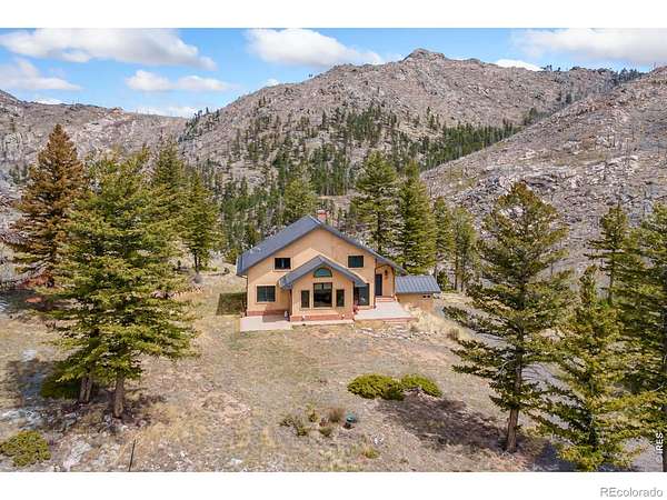 40 Acres of Recreational Land with Home for Sale in Bellvue, Colorado