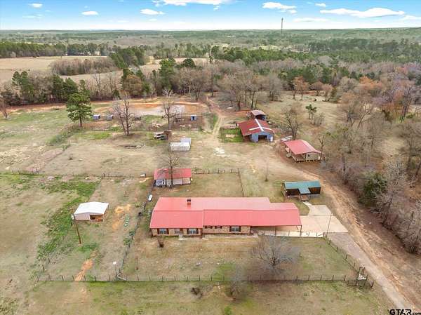 9.85 Acres of Land with Home for Sale in Gilmer, Texas