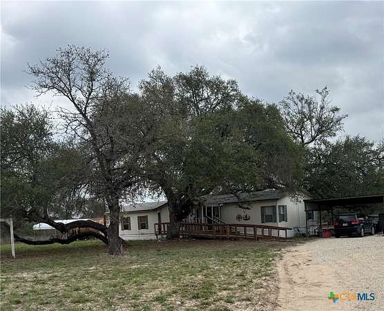 4.88 Acres of Land with Home for Sale in Natalia, Texas