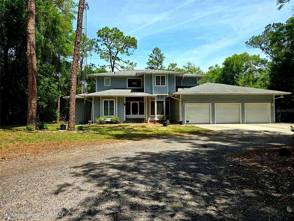 1.73 Acres of Land with Home for Sale in Dunnellon, Florida