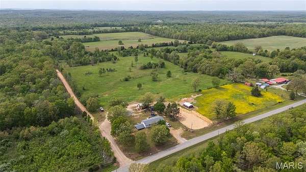 20 Acres of Agricultural Land with Home for Sale in Doniphan, Missouri