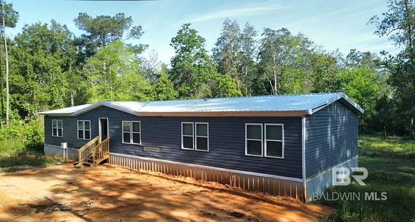 1.8 Acres of Land with Home for Sale in Summerdale, Alabama