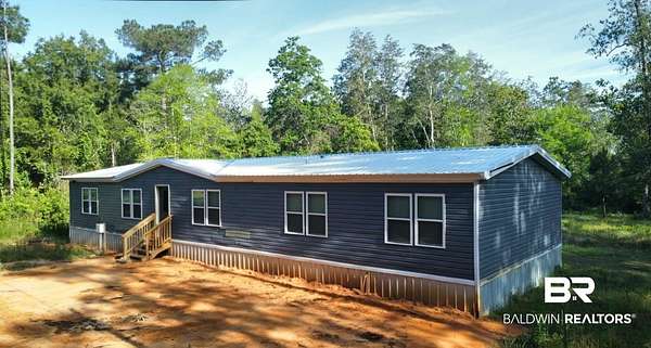 1.8 Acres of Land with Home for Sale in Summerdale, Alabama