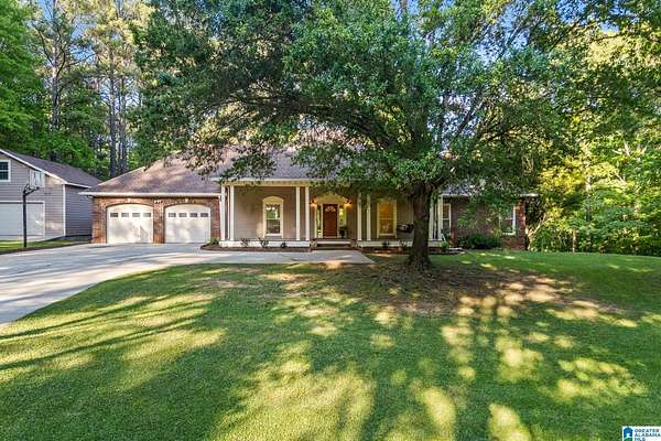 6.7 Acres of Land with Home for Sale in McCalla, Alabama