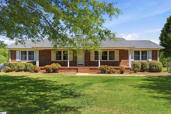3.69 Acres of Land with Home for Auction in Greer, South Carolina