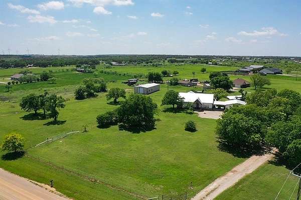 6.86 Acres of Land with Home for Sale in Jacksboro, Texas
