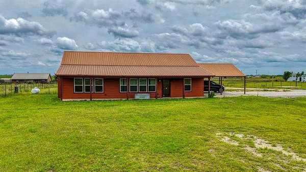 5.32 Acres of Land with Home for Sale in Grandview, Texas