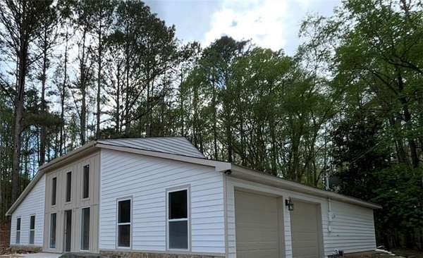 5.83 Acres of Land with Home for Sale in Chattahoochee Hills, Georgia