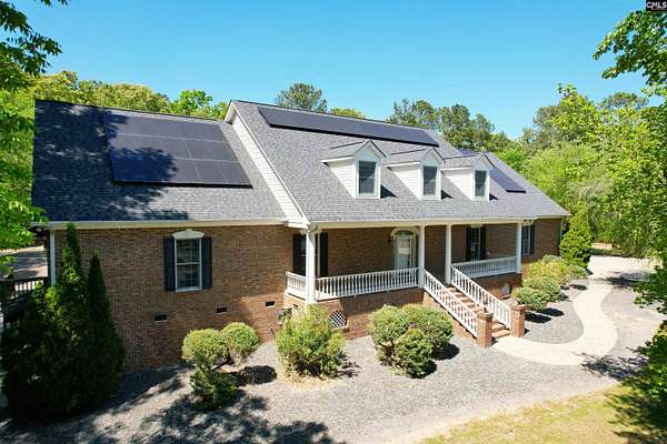 9.3 Acres of Land with Home for Sale in Chapin, South Carolina