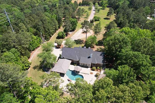9.3 Acres of Land with Home for Sale in Chapin, South Carolina