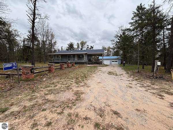 5 Acres of Land with Home for Sale in Grayling, Michigan