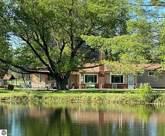 40 Acres of Recreational Land with Home for Sale in Coleman, Michigan