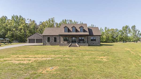 1.89 Acres of Land with Home for Sale in Adamsville, Tennessee