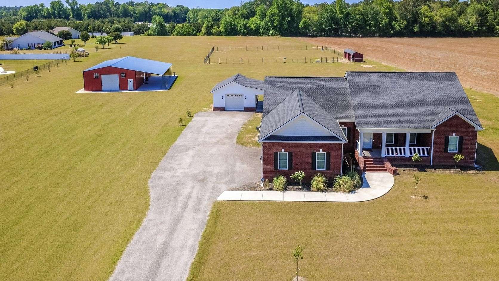 4.89 Acres of Land with Home for Sale in Loris, South Carolina