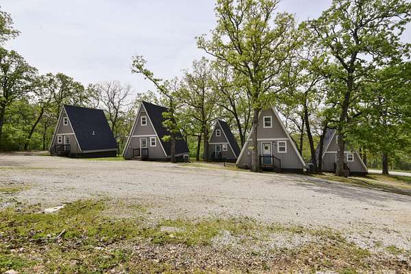 2.83 Acres of Land with Home for Sale in Lampe, Missouri