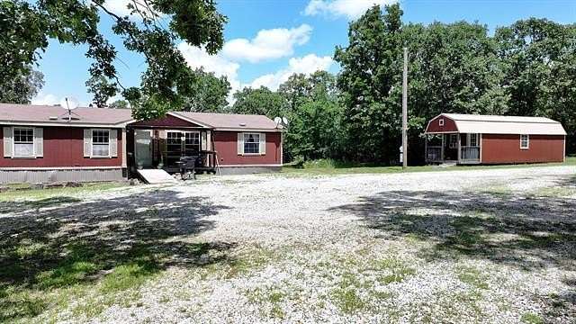 10 Acres of Land with Home for Sale in Gore, Oklahoma