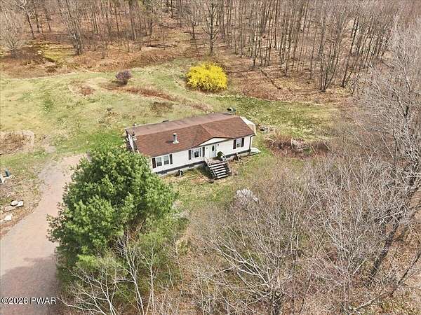 5.12 Acres of Land with Home for Sale in Equinunk, Pennsylvania