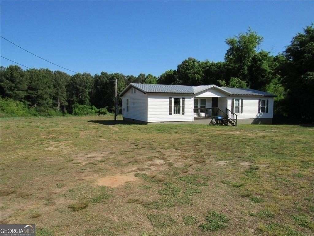 6 Acres of Land with Home for Sale in Bowdon, Georgia