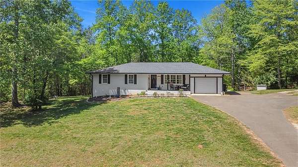 4.5 Acres of Land with Home for Sale in Ball Ground, Georgia