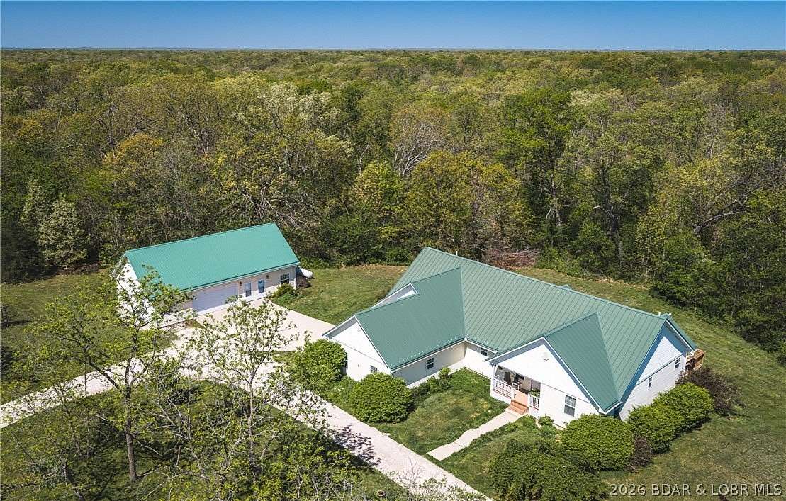 11.7 Acres of Recreational Land with Home for Sale in Barnett, Missouri