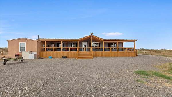 32.3 Acres of Agricultural Land with Home for Sale in Jourdanton, Texas