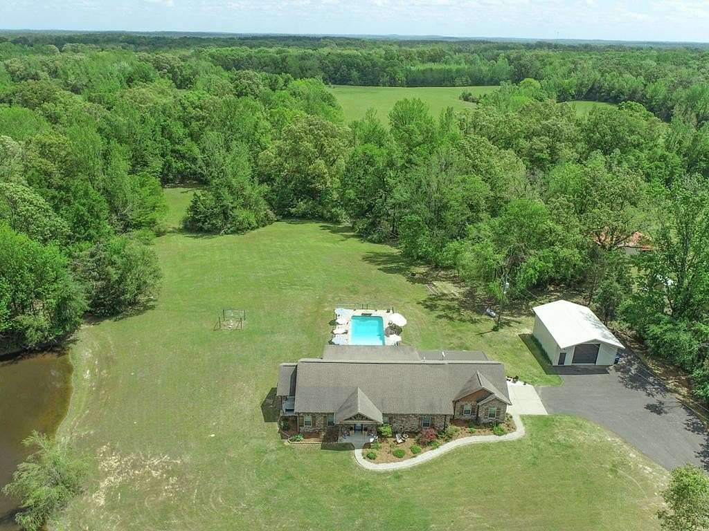 9.2 Acres of Land with Home for Sale in Batesville, Mississippi