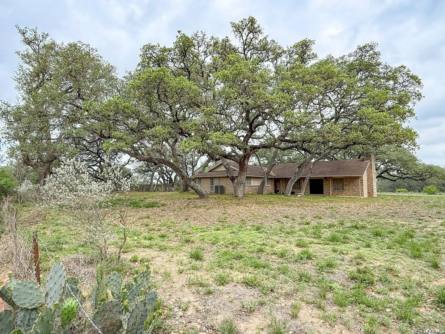 1.58 Acres of Land with Home for Sale in Devine, Texas
