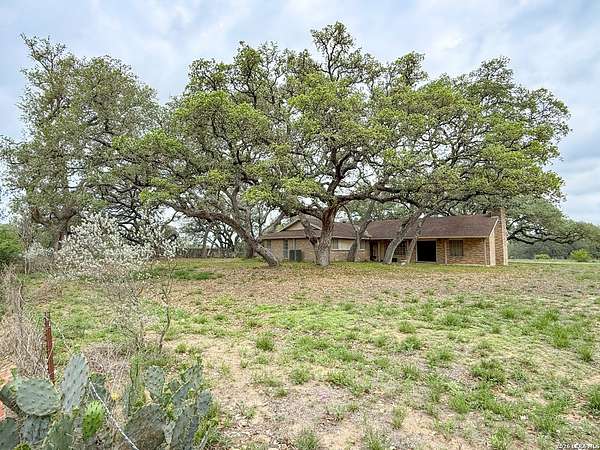 1.58 Acres of Land with Home for Sale in Devine, Texas