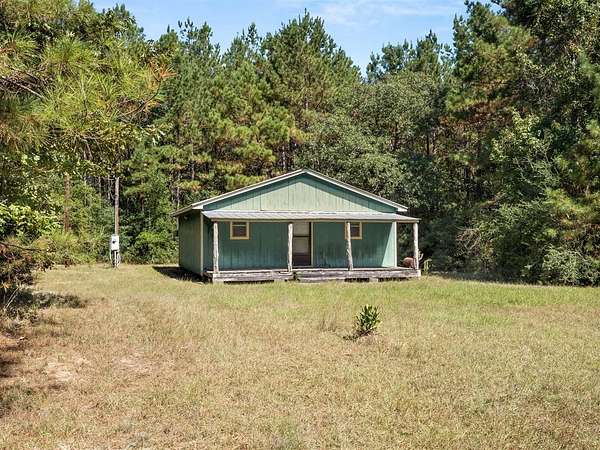 20 Acres of Recreational Land with Home for Sale in Dry Creek, Louisiana