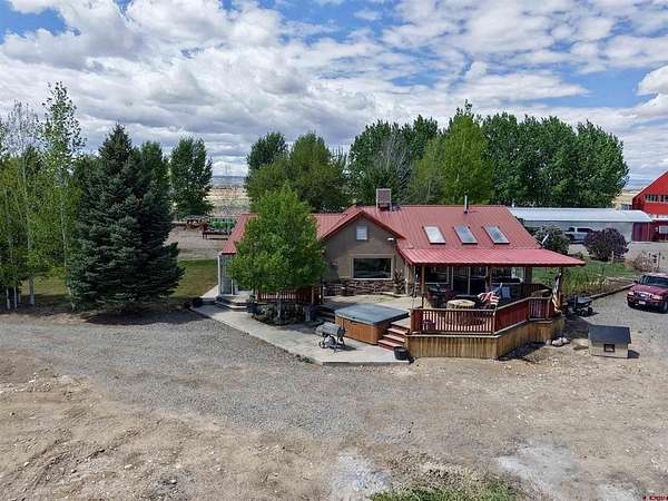 36 Acres of Land with Home for Sale in Olathe, Colorado