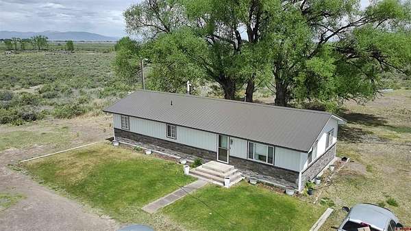 35 Acres of Land with Home for Sale in Sanford, Colorado