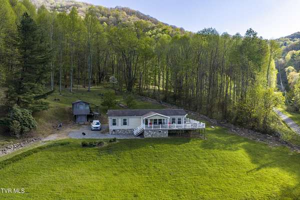 18.3 Acres of Land with Home for Sale in Flag Pond, Tennessee