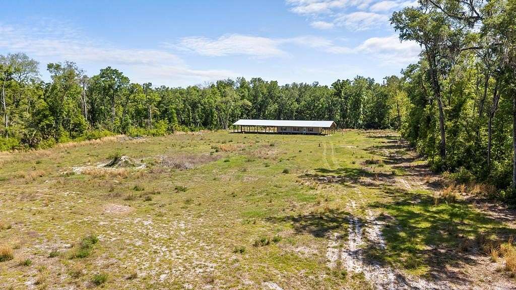 17.7 Acres of Land with Home for Sale in Old Town, Florida