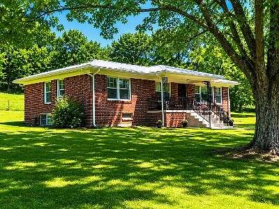 9.67 Acres of Land with Home for Sale in Elmwood, Tennessee