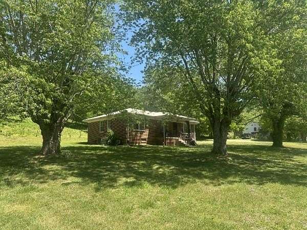 9.67 Acres of Land with Home for Sale in Elmwood, Tennessee