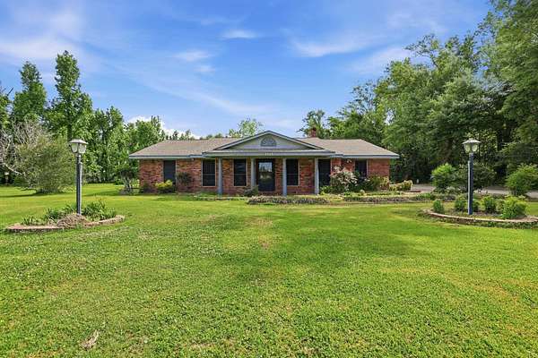 17.4 Acres of Land with Home for Sale in Houma, Louisiana