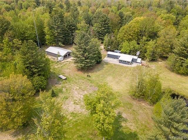 10 Acres of Land with Home for Sale in Orange Township, Michigan