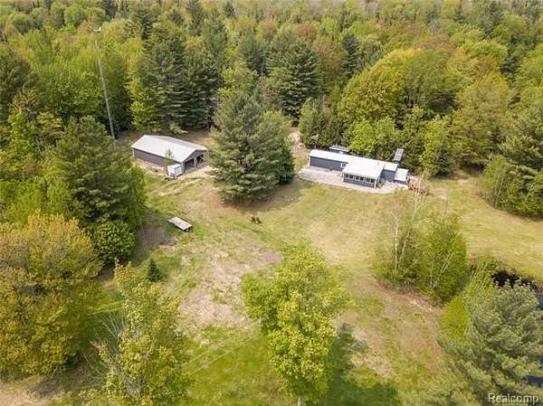 10 Acres of Land with Home for Sale in Orange Township, Michigan