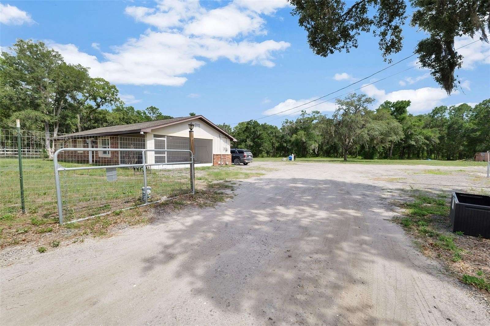 2 Acres of Land with Home for Sale in Spring Hill, Florida