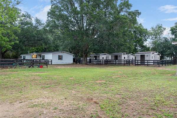4.6 Acres of Land with Home for Sale in Zephyrhills, Florida