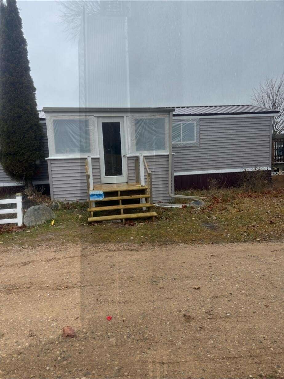 2.47 Acres of Land with Home for Sale in Kalkaska, Michigan