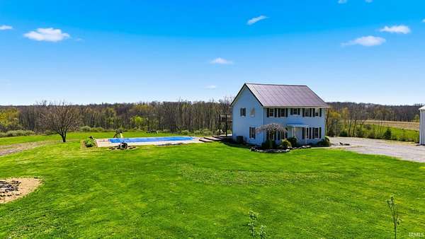 5 Acres of Land with Home for Sale in Pleasant Lake, Indiana