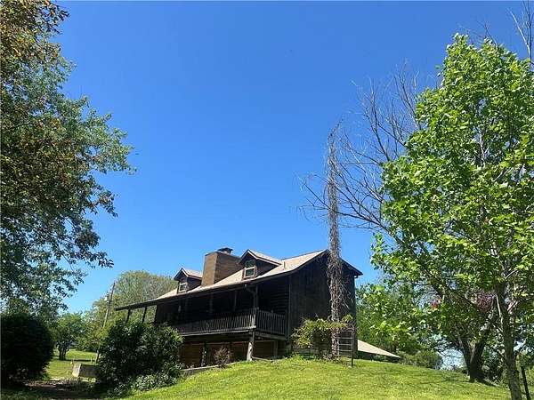 6.3 Acres of Land with Home for Sale in Warrensburg, Missouri