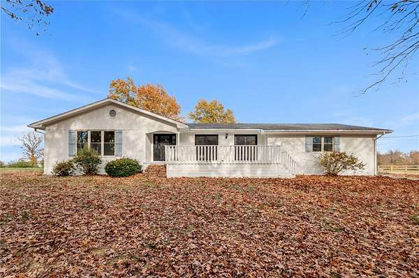 7.23 Acres of Land with Home for Sale in Siloam Springs, Arkansas